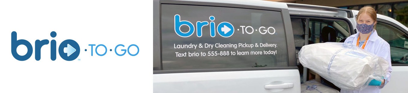 The Brio-to-Go dry cleaning pickup and delivery truck with an employee holding a bundle of laundry.